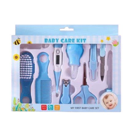 A blue baby care kit featuring thermometer, nasal inhaler, safety nail clippers, comb, and brush designed for grooming and caring for infant.