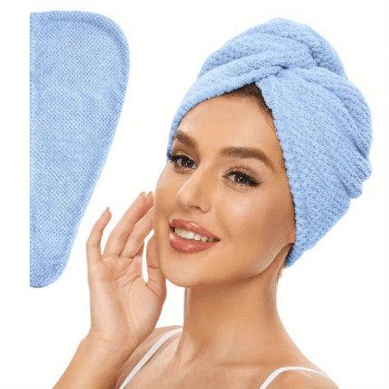 A blue microfiber hair towel, designed for gentle and effective hair drying, suitable for all hair types and perfect for daily grooming and care.