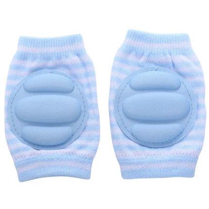 Light blue and white striped baby knee pads with soft, cushioned oval padding in the center for crawling protection.