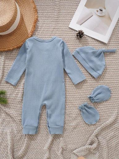 A cute baby Long Sleeve Baby Romper in Sky Blue accompanied by a matching hat and mittens, showcasing a cheerful and playful outfit displaying the text "Hi, I'm new here."