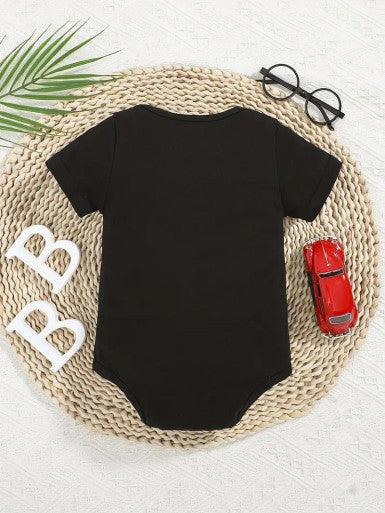 A cute baby black romper showcasing the text "Jesus, He'll be there for You", ideal for expressing faith in children's fashion.