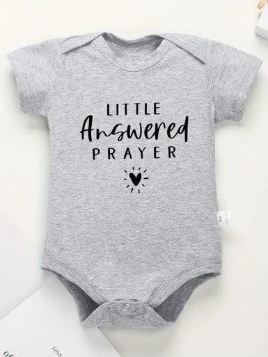 A cute short sleeve baby grey romper showcasing the text "little answered prayer", symbolizing joy and love for a newborn child.