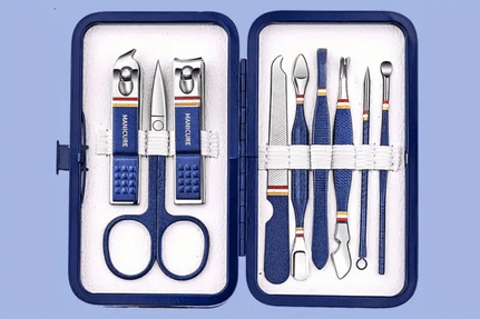 A blue manicure set neatly organized in a matching blue case. The set includes various stainless steel tools, such as nail clippers, scissors, tweezers, a nail file, and cuticle pushers, each secured with white elastic bands. The tools have blue handles with a sleek design, making the set both functional and stylish, perfect for at-home nail care or travel.